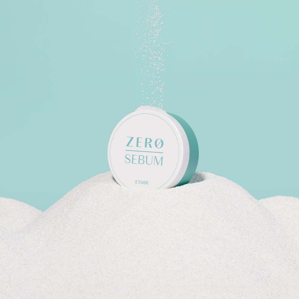 Imagem de ETUDE HOUSE Zero Sebum Drying Powder, com fórmula vegana e livre de talco, ideal para controlar a oleosidade e proporcionar um acabamento matte e suave à pele. Produto perfeito para pele oleosa e mista, que busca controle eficaz de brilho ao longo do dia, sem ressecar. Compre agora!