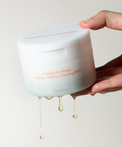 Imagem do Haru Haru Centella Sunflower Makeup-Melting Cleansing Balm, um bálsamo de limpeza vegano e cruelty-free que derrete a maquiagem, enquanto hidrata e acalma a pele com centella asiatica e extratos de girassol, ideal para uma limpeza suave e eficaz.